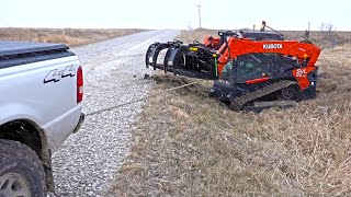 Skid Loader Stuck in Mud [upl. by Tarrah534]