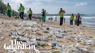 Balis famous beaches covered in plastic garbage [upl. by Spense372]